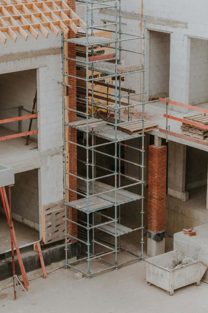 a building under construction with scaffolding around it