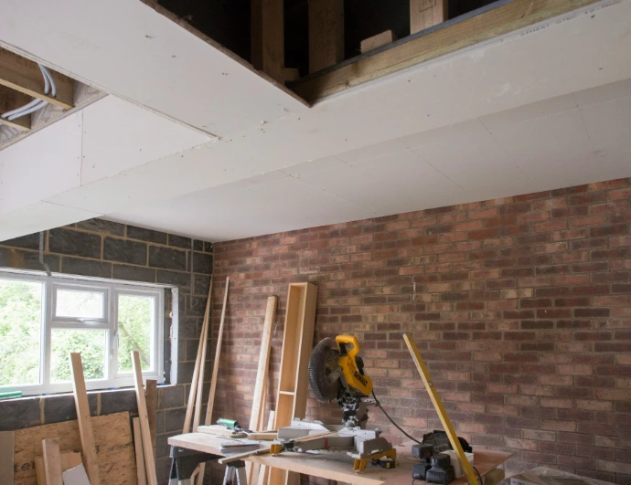a room with roof gettting constructed
