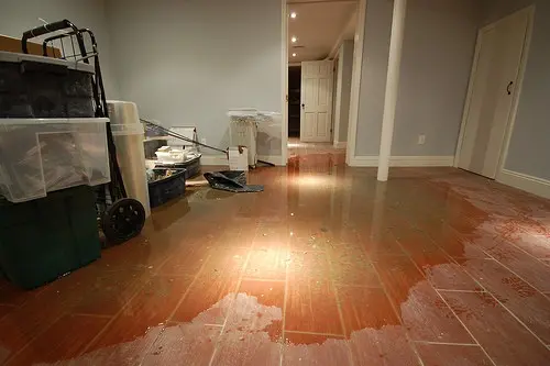 water puddle on floor from water leakage