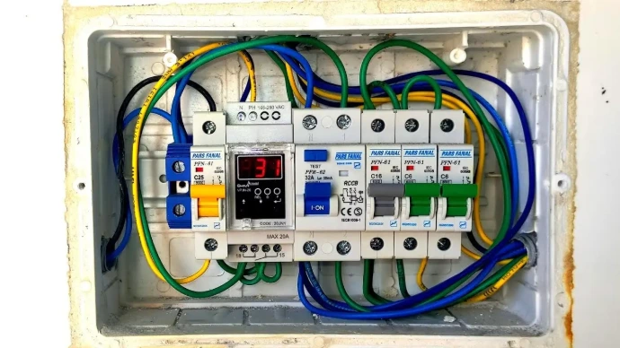 Electrical panel with circuit breakers for plumbing, electrical, and HVAC service support